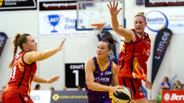 Kate Gaze (left) hopes to bring the winning mentality she was part of at Townsville Fire to the Canberra Capitals. 
