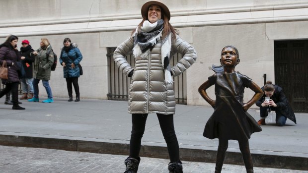 The statue has been given a permanent new home in front of the New York Stock Exchange.