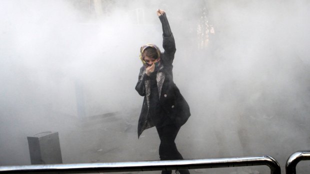 A university student protesting at Tehran University in late December.