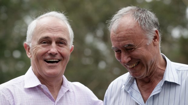 All smiles: Prime Minister Malcolm Turnbull and John Alexander address the media.