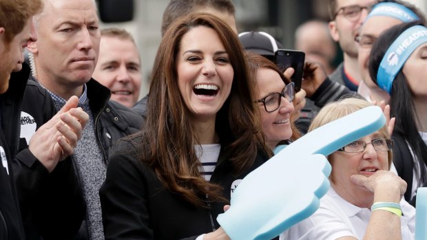 Kate, the Duchess of Cambridge, encourages competitors in the London Marathon.