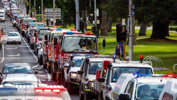 A motorcade of about 250 CFA trucks hit Melbourne streets on Saturday in protest over fears of a secret deal between the state government and the firefighters union.