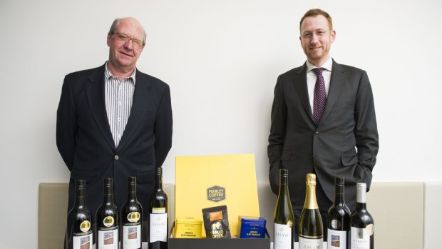 Shaw Vineyard Estate director Graeme Shaw, and the Australian Trade Commission's Brett Cooper with Shaw wine and Marley Coffee. 
