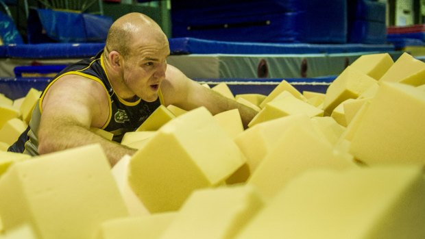 Stephen Moore in a foam pit for rehabilitation.