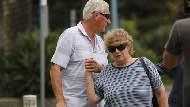 William Harrie Spedding with his wife, Margaret, leave the Port Macquarie police station on Friday morning.