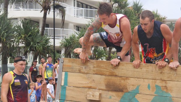 Men at work: Beams with teammates at the training camp in Noosa.