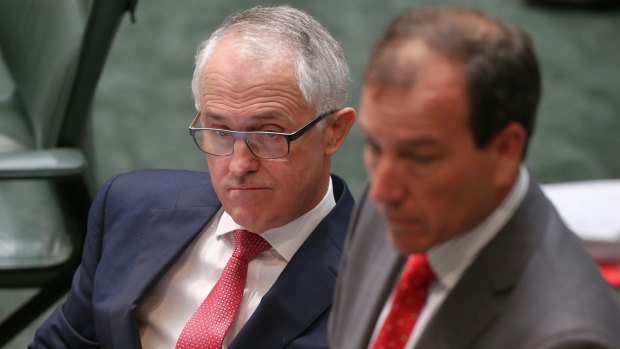 Prime Minister Malcolm Turnbull and former frontbencher Mal Brough during Question Time at Parliament House in early December.