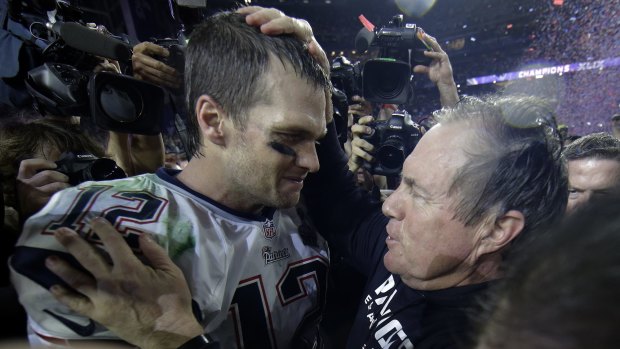 Big two, big four: New England Patriots quarterback Tom Brady celebrates with head coach Bill Belichick after winning Super Bowl XLIX.