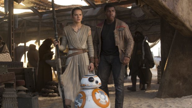 Daisy Ridley and John Boyega in <i>Star Wars: The Force Awakens</i>.