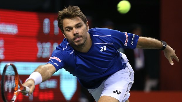 Stan Wawrinka of Switzerland plays a forehand return to Benoit Paire of France in the final of the Japan Open on Sunday.