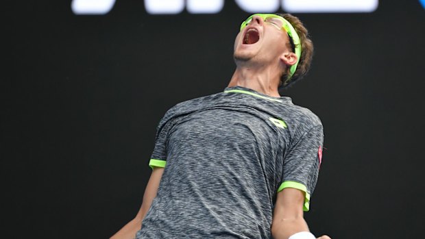 Istomin celebrates his win.