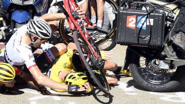Pile-up: Chris Froome, right, wearing the yellow jersey, Bauke Mollema, centre and Richie Porte .