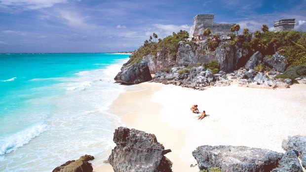 Mayan ruins overlooking the Caribbean Sea and beach at Tulum, Yucatan Peninsula.