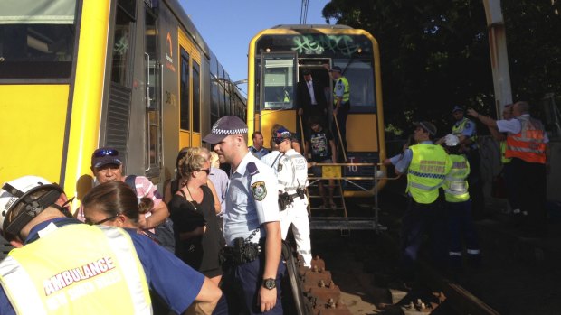 Passengers are evacuated from the derailed train at Edgecliff in January last year.