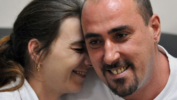 Serge Atlaoui, a Frenchman on death row in Indonesia, with his wife, Sabine Atlaoui, during one of her visits to Nusakambangan prison island. 