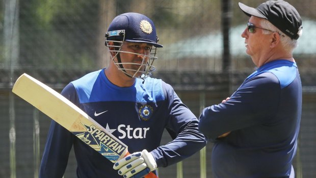M.S. Dhoni with coach Duncan Fletcher at the Adelaide Oval on Monday.