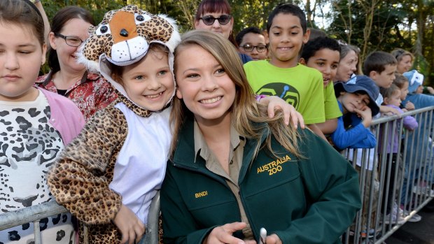 Bindi Irwin with one of her many fans who helped celebrate her birthday by wearing animal onsies.