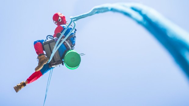 Tim Greschke of Rope Access Engineering in a Spiderman costume at Canberra Hospital.