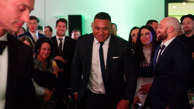 Josh Papalii heads to the stage after being named the Raiders' joint player of the year with Josh Hodgson.