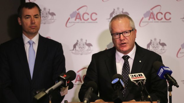 Justice Mnister Michael Keenan, left,  and Australian Crime Commission chief Chris Dawson. The government plans to incorporate the  Australian Institute of Criminology within the ACC.