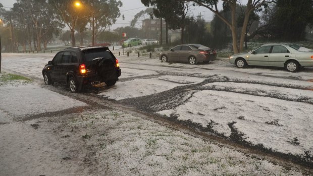 Cars are pelted with hail in Kingsford.