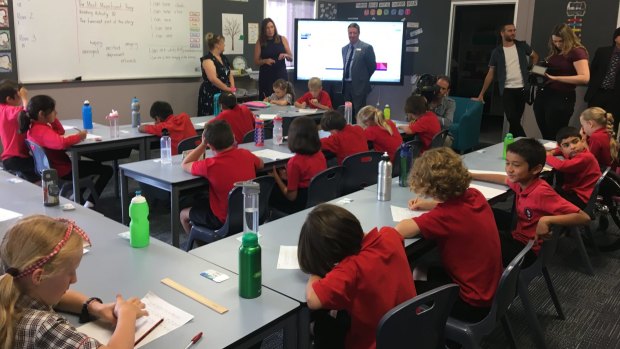 Education Minister Yvette Berry drops in on a year 3 class learning in Aranda Primary's new transportable building.