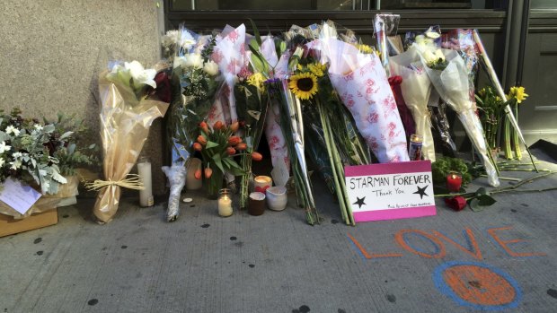Tributes for David Bowie outside his apartment building in Manhattan.