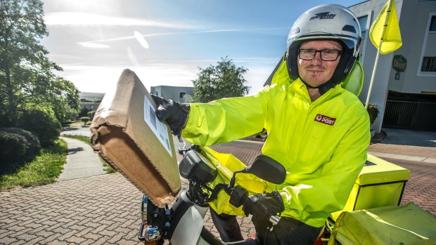 Australia Post postal delivery officer Daniel Mapstone has begun working earlier hours to deliver parcels when people are more likely to be at home to receive them. 