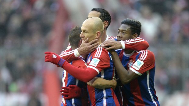 Arjen Robben (centre) was one of three Bayern players to score twice.