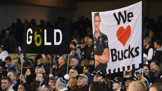 Magpies fans show their support for Nathan Buckley.