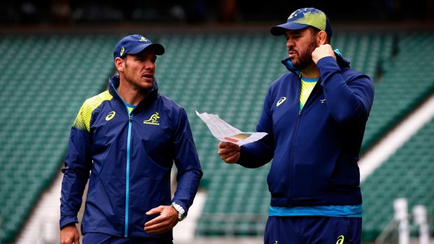 Spy claims: Michael Cheika with the piece of paper which revealed the Wallabies' tactics.