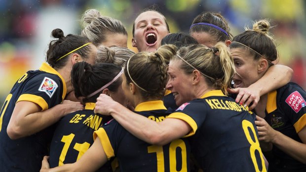 Ecstasy: The Matildas celebrate victory over Brazil at the World Cup.