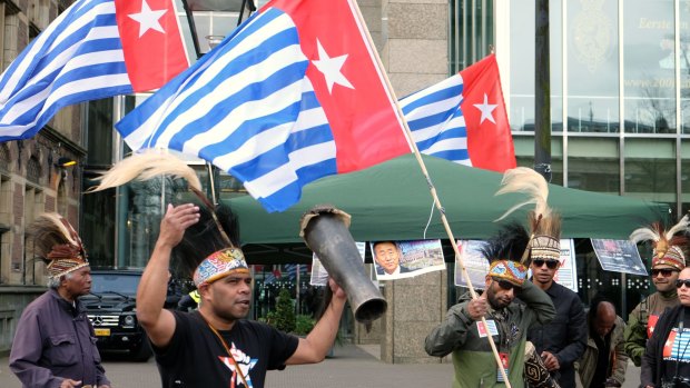 Activists campaigning for Papuan independence dance outside the Dutch Parliament in The Hague in April.