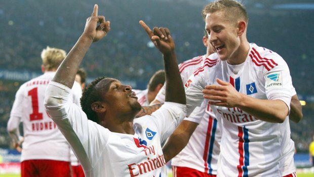 Lewis Holtby and Cleber Reis (left) celebrate Hamburg's opening goal.