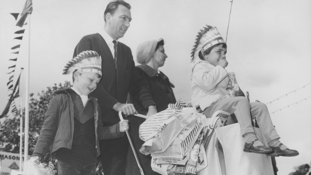 Mr and Mrs John Kenter with their children John, Francisca and baby David, in the pusher, at the Royal Melbourne Show in 1966. 
