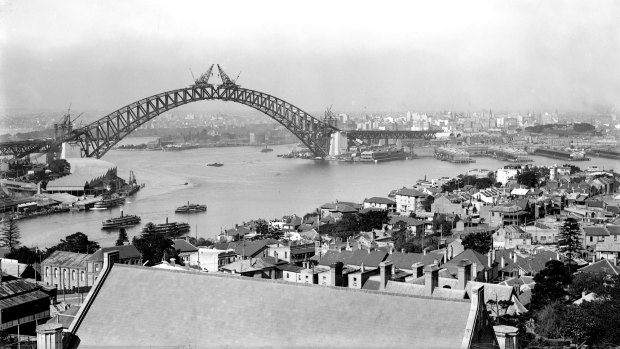 View from North Sydney of the construction of the Sydney Harbour Bridge in  1930.