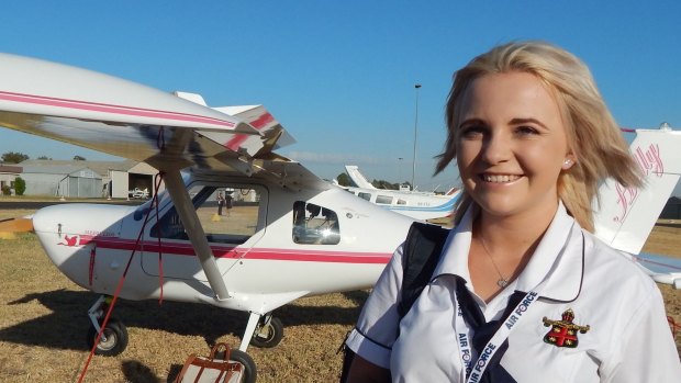 Holly Adams shortly after completing her first solo flight from Narromine to Dubbo. 
