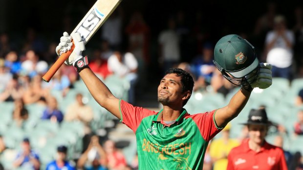 Bangladesh batsman Mohammad Mahmudullah celebrates after reaching his century.