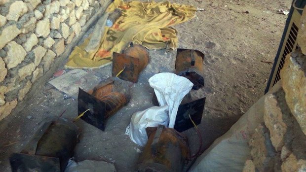Unexploded bombs left behind by IS militants near al-Houz bridge on the Euphrates river west of Baghdad.
