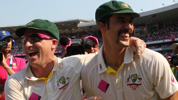 Brad Haddin and Mitchell Johnson celebrate the Ashes whitewash in 2014.