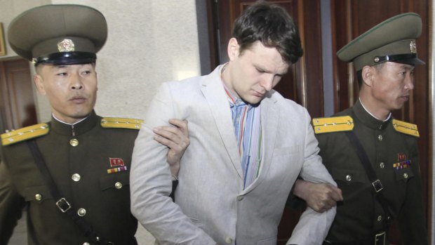 American student Otto Warmbier, 21, leaves the Supreme Court in Pyongyang on Wednesday.