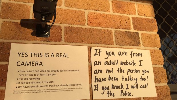 Signs and security put up by Robyn Night and her husband in response to dozens of visits from men expecting sex.