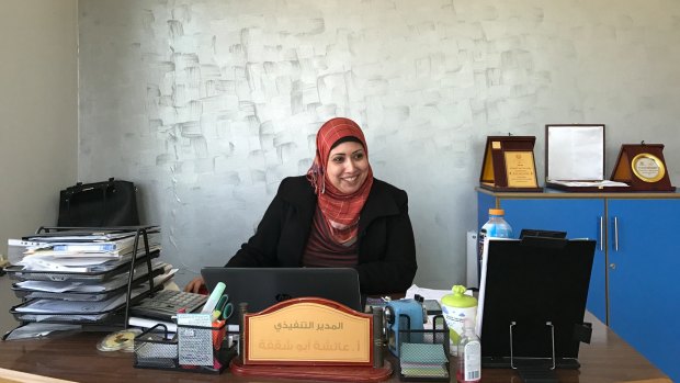 Aesha Abu Shaqfa works at the Future Development Commission, one of many local NGOs seeking to further women's rights in a male-dominated society.