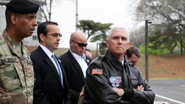 US Vice-President Mike Pence, right, visits the truce village of Panmunjom in the Demilitarized Zone in Paju, South Korea.