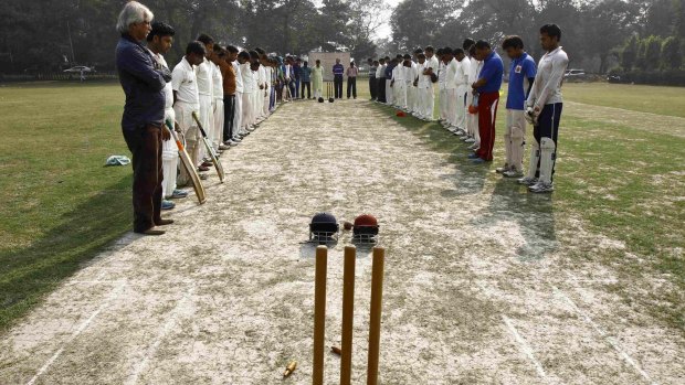 Indian players observing a moment of silence before a match in Kolkata.