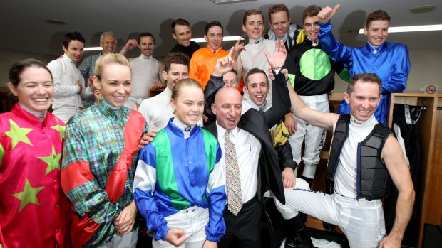 Mr Popular: Jim Cassidy receives a well-earned cheer in the jockeys’ rooms. Photo: bradleyphotos.com.au