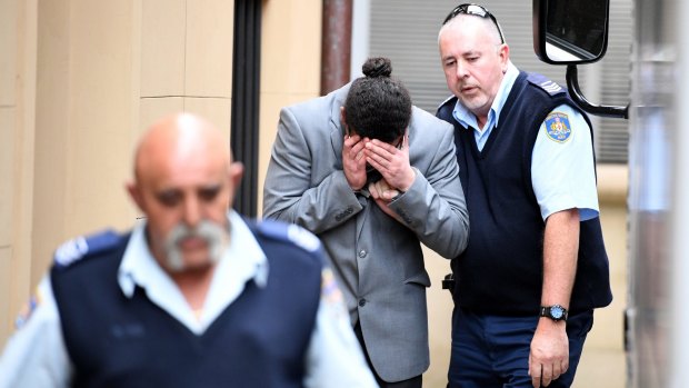 Aymen Terkmani is led away from the Supreme Court in Sydney on August 21 after being found guilty of murdering teenager Mahmoud Hrouk.