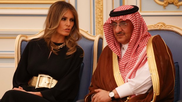 Melania Trump talks with Saudi Crown Prince Muhammad bin Nayef. Her appearance was no different to Michelle Obama's two years ago.