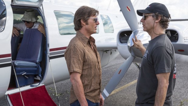 Tom Cruise and director Doug Liman on the set of American Made.