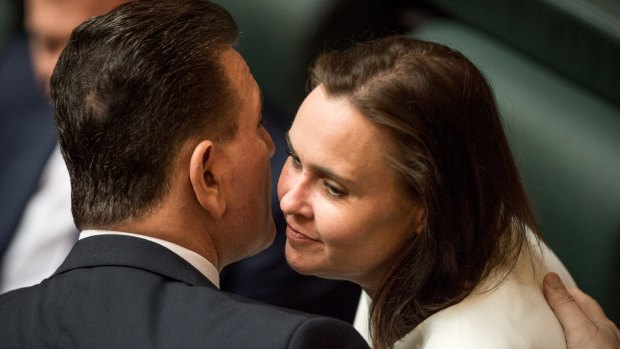 Jane Garrett in Parliament on Tuesday, being comforted by Sports Minister John Eren.